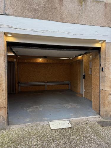an empty parking garage in a building at La Loge Lingonne in Langres