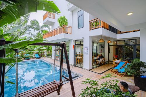 Bazén v ubytování Palm Riverside Boutique nebo v jeho okolí