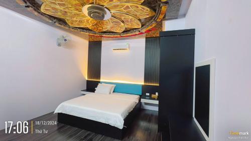 Katil atau katil-katil dalam bilik di Hưng Phú 3 Hotel