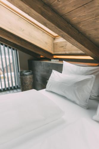 Ένα ή περισσότερα κρεβάτια σε δωμάτιο στο LIVALPIN Chalet