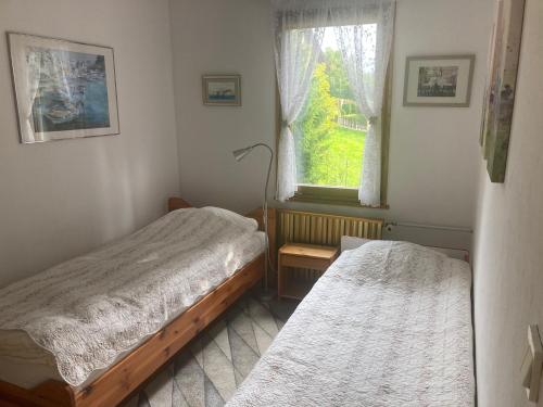 Postel nebo postele na pokoji v ubytování U Aluśki