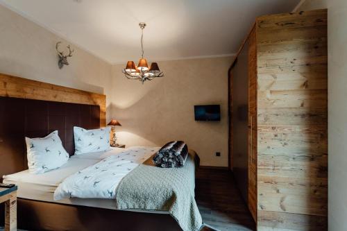 A bed or beds in a room at Residenz JANET by MoniCare