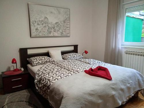 Postel nebo postele na pokoji v ubytování Apartman Malina