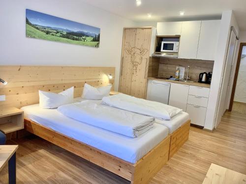 Kuchyň nebo kuchyňský kout v ubytování Alpenrose Appartements