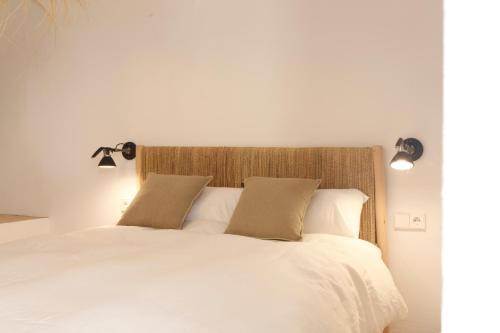 Cama o camas de una habitación en Maram Brava casa centro Begur Metge Pi
