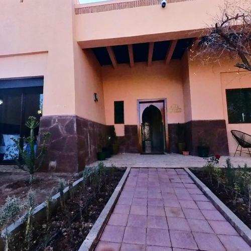 an entrance to a building with a courtyard at Villa Belle vue - with a private & Heated pool in Marrakesh