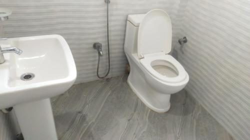 Koupelna v ubytování Hotel Dilip