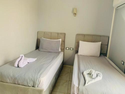 Ένα ή περισσότερα κρεβάτια σε δωμάτιο στο NADA - HOTEl