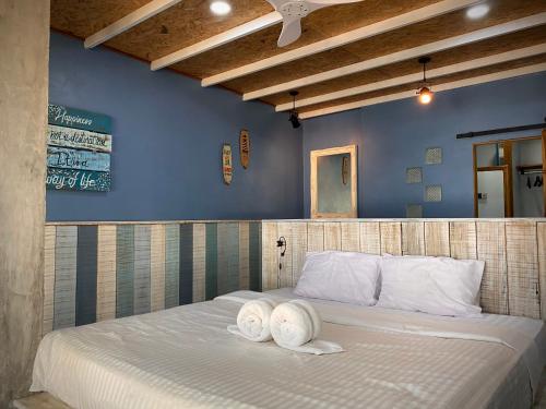 Postel nebo postele na pokoji v ubytování PP Land Beach Eco Resort
