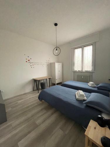 Ένα ή περισσότερα κρεβάτια σε δωμάτιο στο La Casa di Mimmi