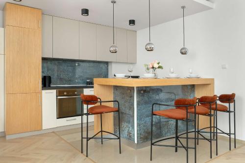 Kuchyňa alebo kuchynka v ubytovaní Stylish Apartment in the Heart of Kazimierz in Kraków by Noclegi Renters