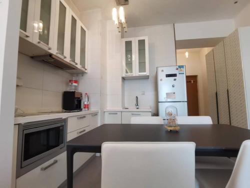 Eldhús eða eldhúskrókur á Apple Community North District Serviced Apartment
