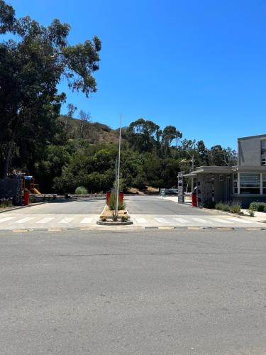 an empty street in front of a building at Apartment in Papudo in Agua Salada