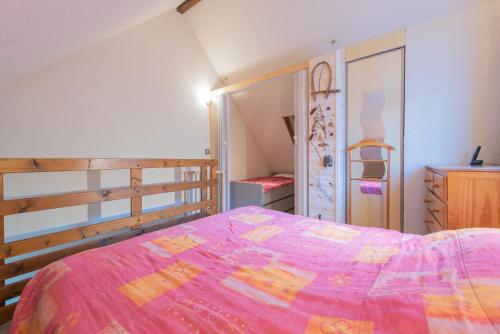 Ένα ή περισσότερα κρεβάτια σε δωμάτιο στο Chalet 4 Personnes classé 3 étoiles