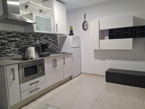 Η κουζίνα ή μικρή κουζίνα στο Casa Paula - 22