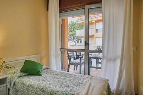 Una cama o camas en una habitación de FGDR322F Cala de la Maza