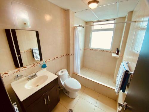 a bathroom with a sink and a toilet and a shower at Vista al mar, Mini alberca y roof garden PRIVADO! in Boca del Río