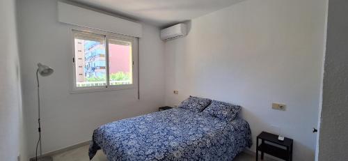 Voodi või voodid majutusasutuse Apartment with sea view in Torremolinos toas