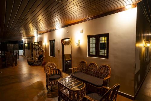 Χώρος καθιστικού στο Yaala - Coorg Riverside Retreat