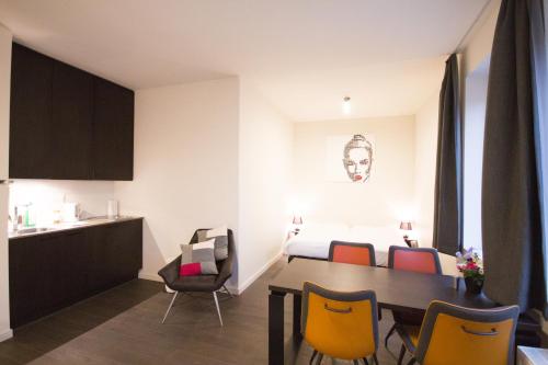 TV a/nebo společenská místnost v ubytování Getaway Studios Leuven