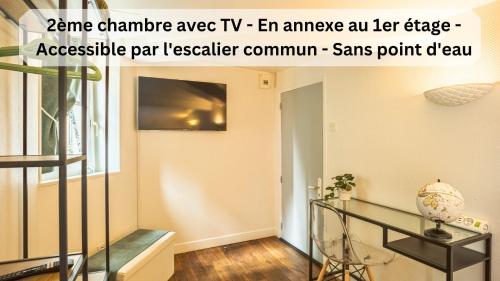 an image of a room with a staircase and a window at Le Logis des Perles 2 - Emplacement Idéal - 6 pers in Troyes