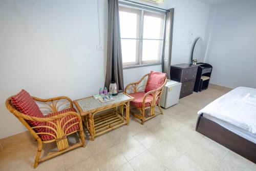 Katil atau katil-katil dalam bilik di X Mitr Inn HuaHin Beach มิตร อินน์ ชายหาดหัวหิน