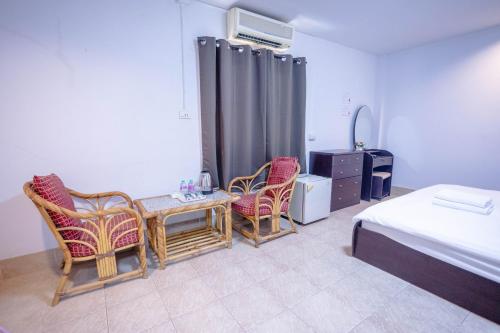 Katil atau katil-katil dalam bilik di X Mitr Inn HuaHin Beach มิตร อินน์ ชายหาดหัวหิน