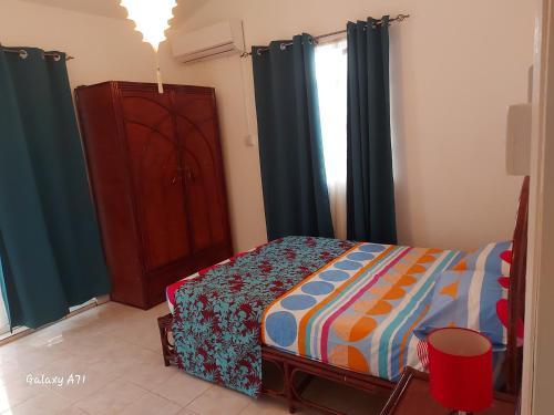 Ένα ή περισσότερα κρεβάτια σε δωμάτιο στο Holiday Home close to the BEACH
