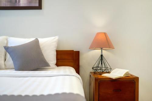 Sands River Hoi An Villaにあるベッド