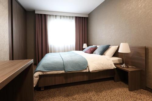 Hotel Portoにあるベッド