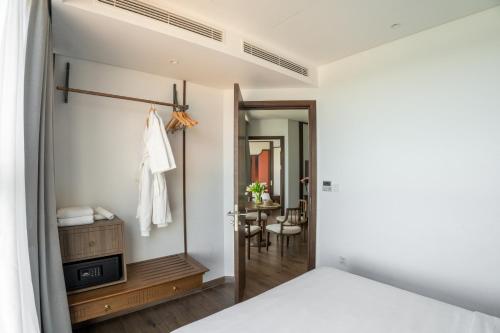 Postel nebo postele na pokoji v ubytování Mandala Apartment & Resort Chambay - Just 15 mins from Mui Ne Hon Rom