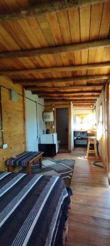 Voodi või voodid majutusasutuse TINY HOUSE Refugio de Mar toas