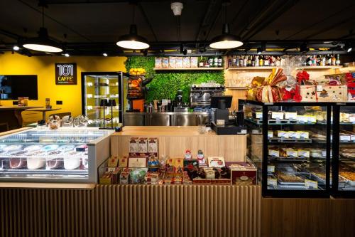 a food counter in a store with food on display at Isabella Suites in Il-Gżira