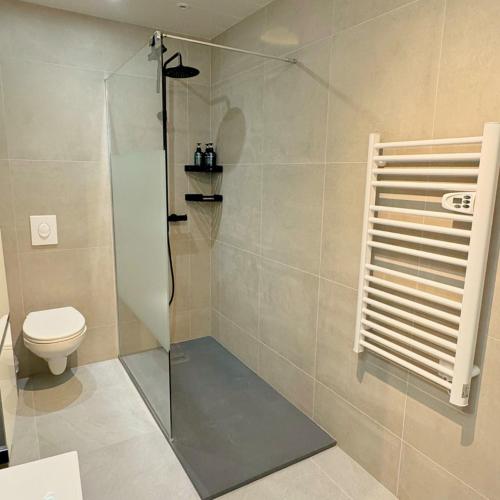 Ένα μπάνιο στο Au Soleil - Appartement confortable