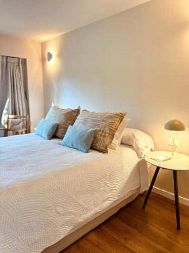 Postel nebo postele na pokoji v ubytování Hotel L'Auberge