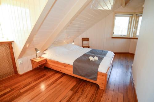 Giường trong phòng chung tại Uilen