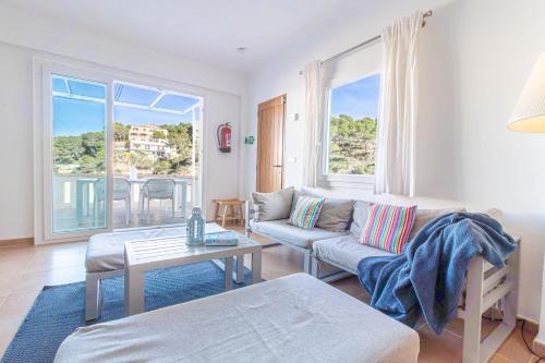 Χώρος καθιστικού στο Beachhouse Sa Barca