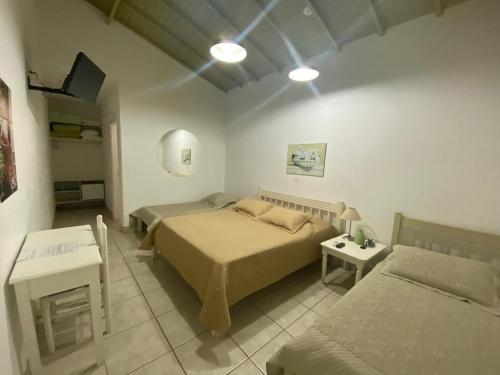 Ένα ή περισσότερα κρεβάτια σε δωμάτιο στο Villa do Conde