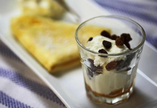 a glass of ice cream with chocolate chips and toast at Hotel Zur Krone in Ronneburg