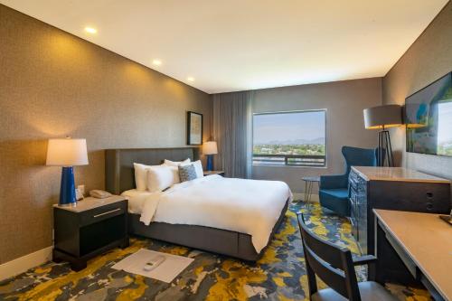 Hotel Lucerna Hermosilloにあるベッド