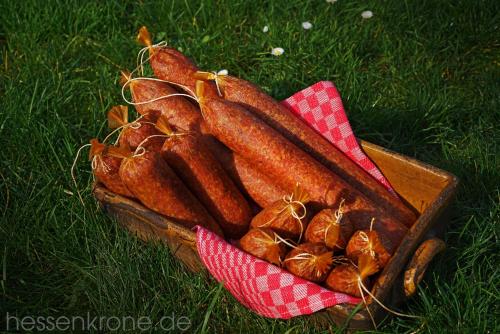 a basket of carrots and other foods on the grass at Hotel Zur Krone in Ronneburg