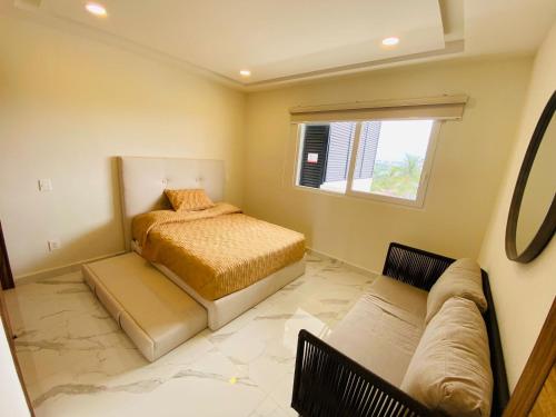 Ένα ή περισσότερα κρεβάτια σε δωμάτιο στο Quinta San Miguel Ocean & Canal