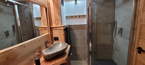 a bathroom with a sink and a shower at WhiteRelaxPila in Pila