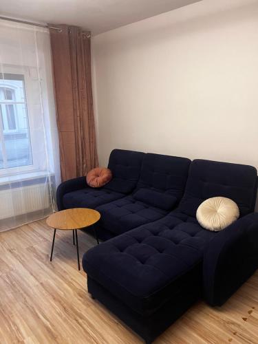 Uma área de estar em Apartament na Grodowej koło Rynku