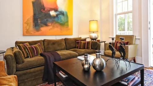 a living room with a couch and a coffee table at Chic 1 BR Units Near Dilworth in Charlotte