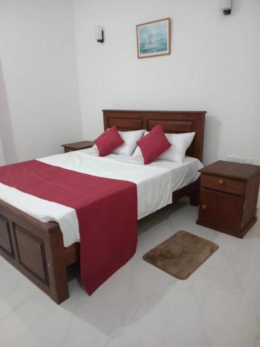 Ένα ή περισσότερα κρεβάτια σε δωμάτιο στο Golden Villa Ella