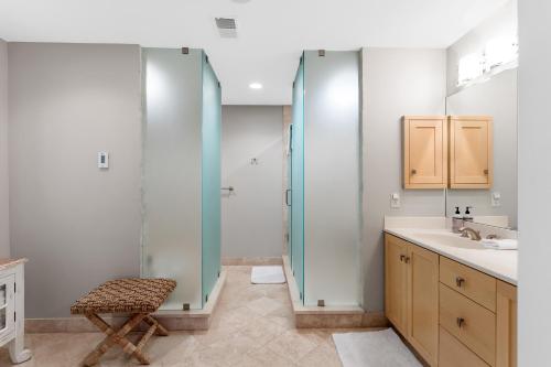 a bathroom with a shower and a sink at Dreamview- Private Lake frontage in Spring Lake