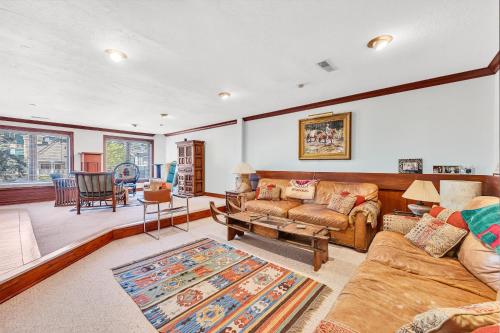 a living room with a couch and a table at 613 Main Street in Park City