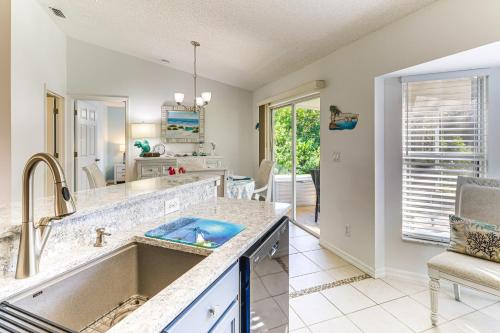 a kitchen with a sink and a counter top at Private Yard and Screened Patio Sunny Sebastian Gem in Sebastian