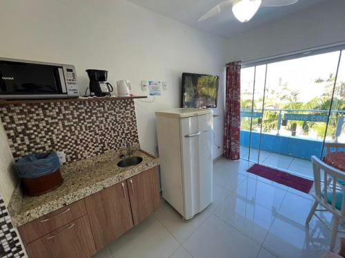 Dapur atau dapur kecil di Pousada Bella Praia